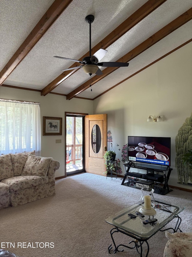 carpeted living room featuring ceiling fan, vaulted ceiling with beams, and a textured ceiling