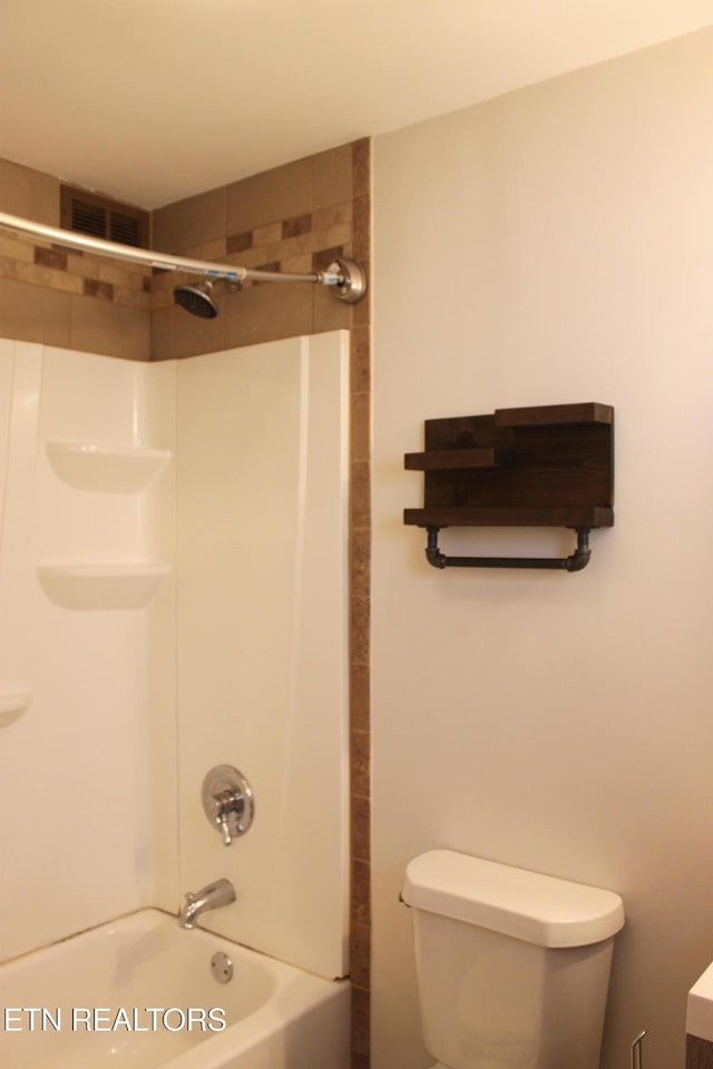 full bathroom featuring visible vents, toilet, and  shower combination