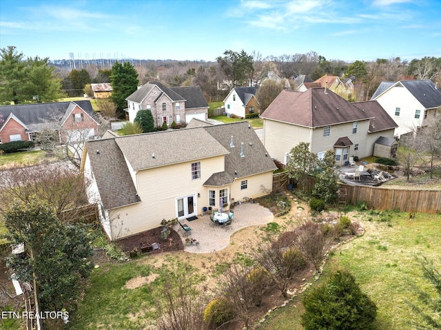 birds eye view of property with a residential view