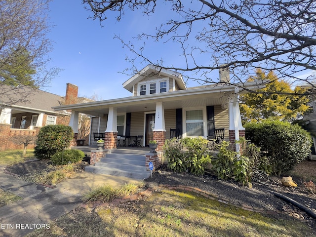 view of front of home featuring covered porch