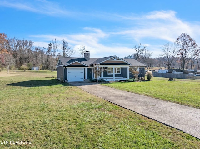 view of front of property featuring an attached garage, fence, a front yard, a chimney, and driveway