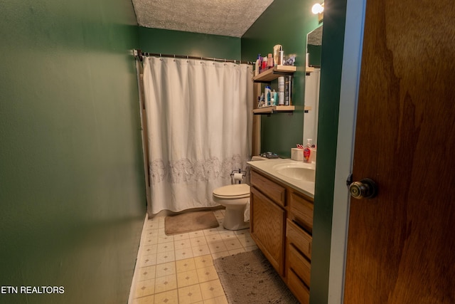 bathroom featuring vanity, a shower with shower curtain, a textured ceiling, tile patterned floors, and toilet