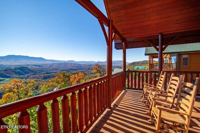 balcony featuring a mountain view