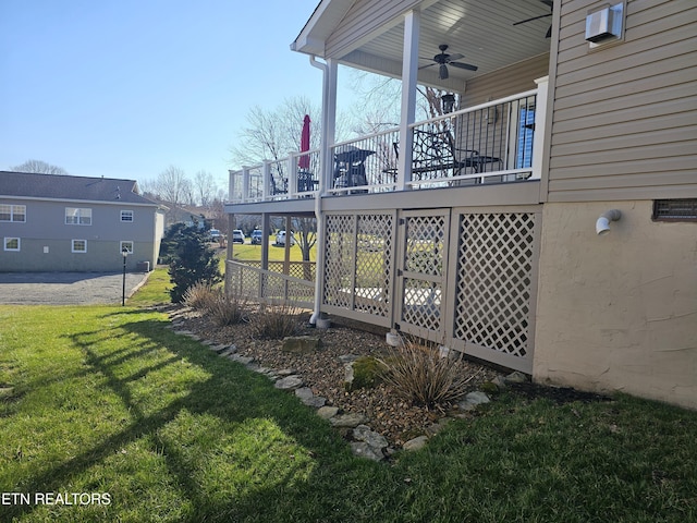 view of yard featuring a ceiling fan