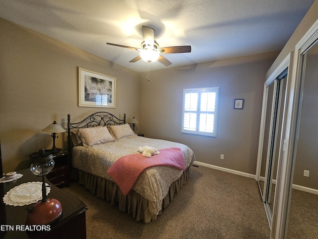 bedroom with baseboards, a textured ceiling, ceiling fan, and carpet flooring