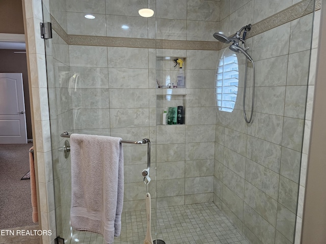 full bathroom with a shower stall