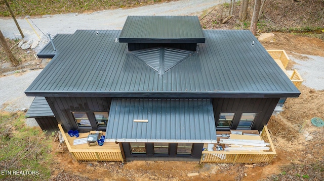 exterior space with metal roof