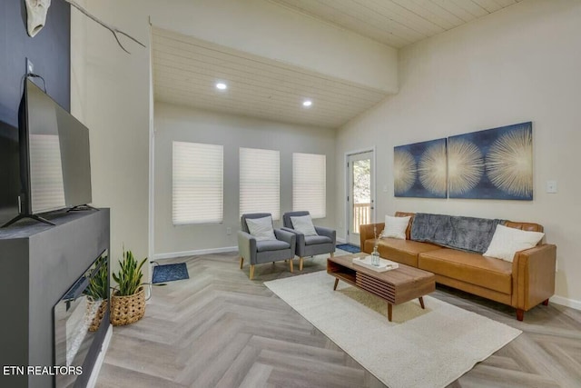 living area with recessed lighting, baseboards, and wood ceiling