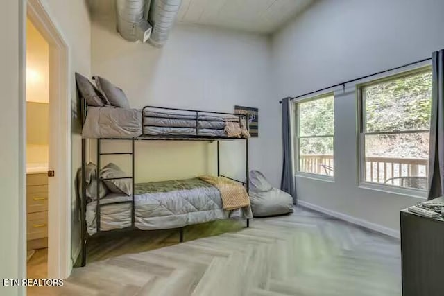 bedroom featuring baseboards