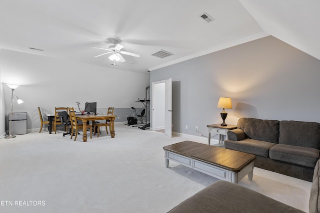 carpeted living room featuring visible vents, baseboards, a ceiling fan, and crown molding