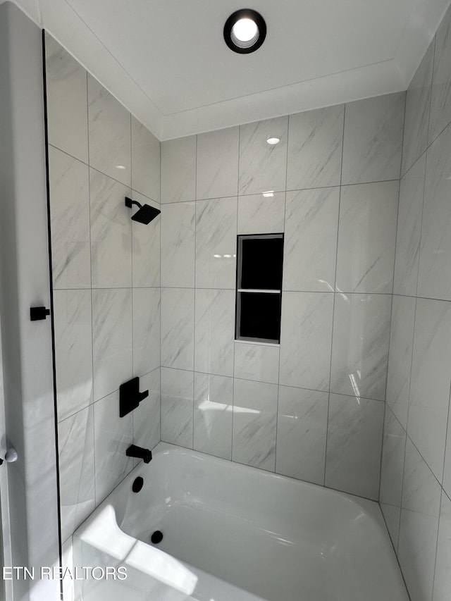 bathroom with shower / washtub combination