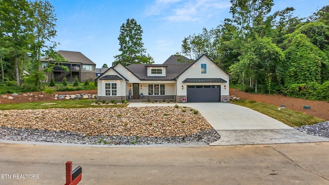 113 Nuhya Way, Loudon, TN 37774 - modern farmhouse style home with concrete driveway and a garage