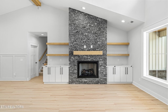 113 Nuhya Way, Loudon, TN 37774 - unfurnished living room with high vaulted ceiling, light wood finished floors, stairway, recessed lighting, and beamed ceiling