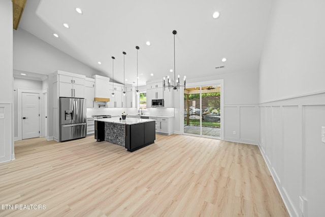 113 Nuhya Way, Loudon, TN 37774 - kitchen featuring appliances with stainless steel finishes, light countertops, a kitchen island, white cabinets, and recessed lighting