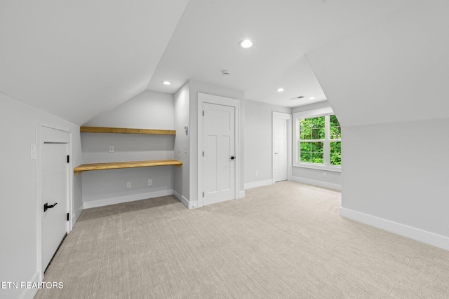 113 Nuhya Way, Loudon, TN 37774 - additional living space with vaulted ceiling, recessed lighting, and carpet floors