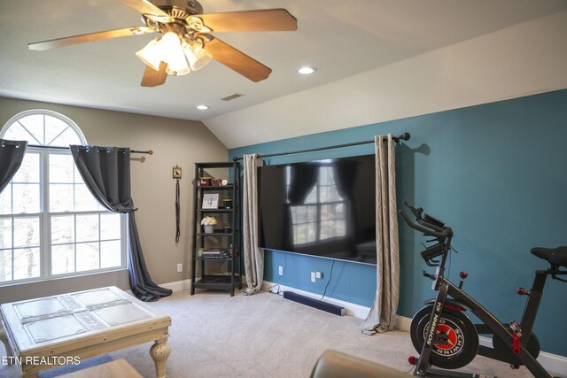 interior space featuring baseboards, visible vents, carpet floors, recessed lighting, and vaulted ceiling