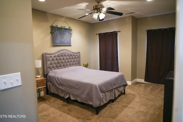 bedroom featuring baseboards, carpet, and a ceiling fan