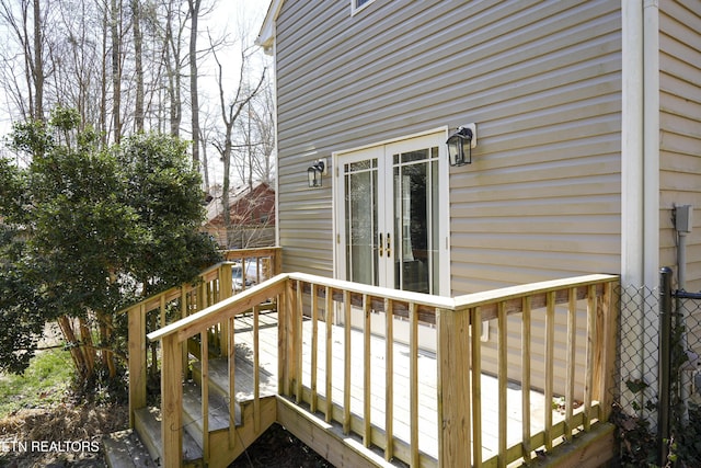 wooden terrace featuring french doors