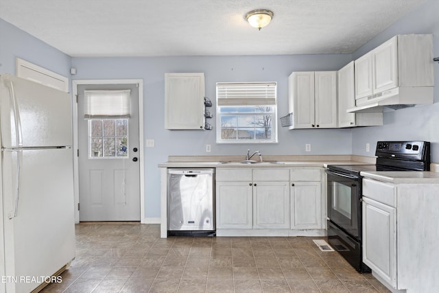 kitchen with freestanding refrigerator, a sink, black electric range, under cabinet range hood, and dishwasher