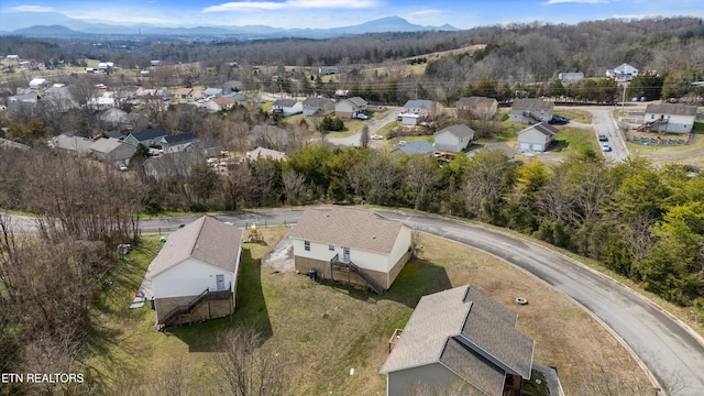 bird's eye view with a residential view and a mountain view