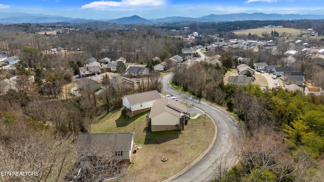 drone / aerial view with a mountain view and a residential view