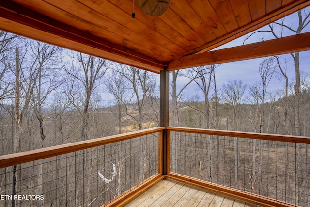 wooden terrace with a forest view