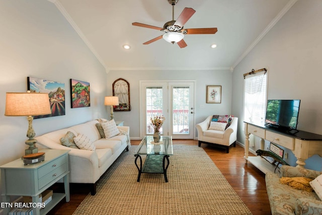 living area featuring lofted ceiling, dark wood-style floors, recessed lighting, crown molding, and baseboards