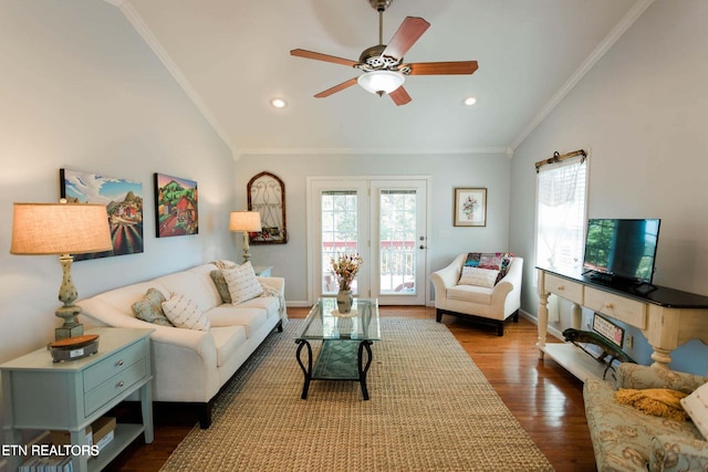 living room with dark wood finished floors, vaulted ceiling, crown molding, and ceiling fan