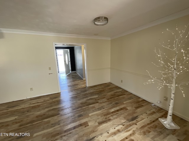 2691 Peavine Rd, Crossville, TN 38571 - spare room with baseboards, wood finished floors, and ornamental molding