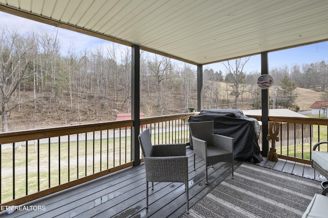 wooden deck featuring grilling area