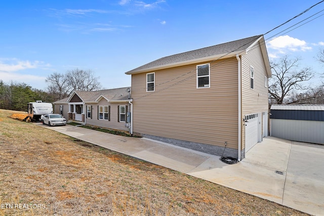 exterior space featuring driveway and a garage