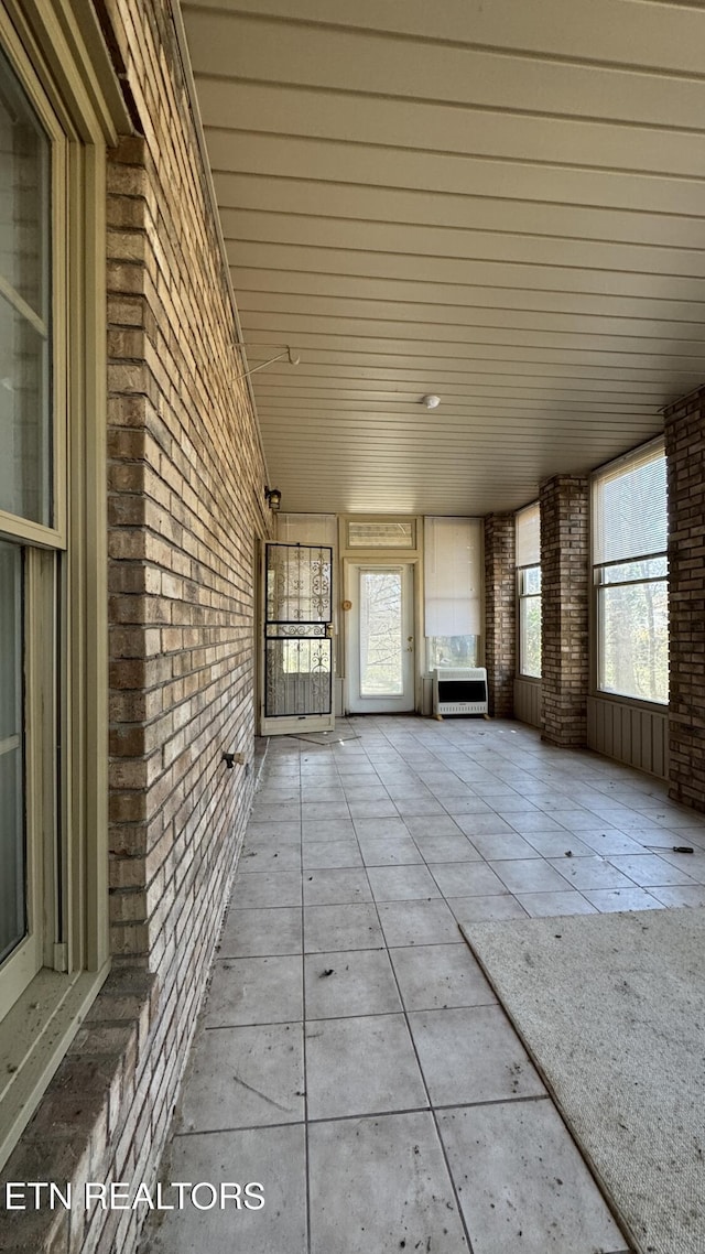 view of unfurnished sunroom