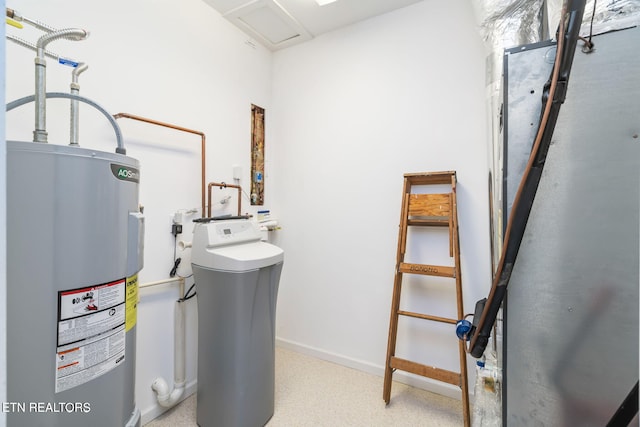 utility room featuring water heater