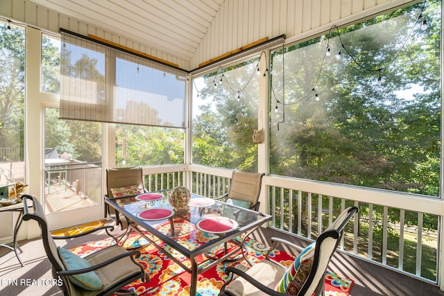 sunroom with vaulted ceiling