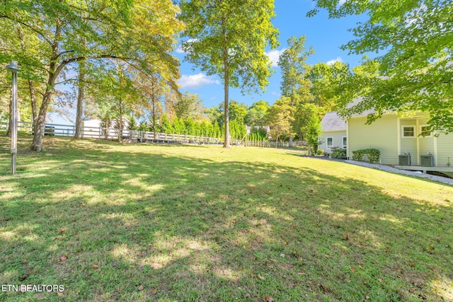 view of yard with fence