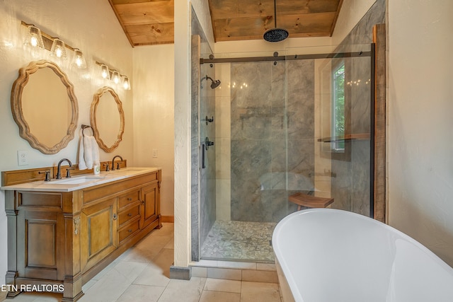 bathroom with a shower stall, a freestanding tub, wooden ceiling, and a sink