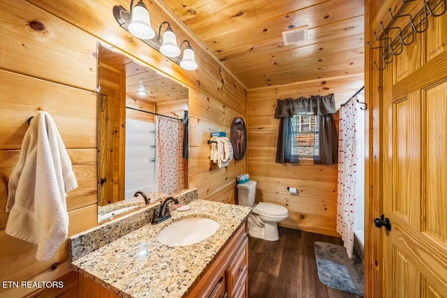 full bathroom featuring a shower with shower curtain, wood finished floors, visible vents, wood ceiling, and toilet