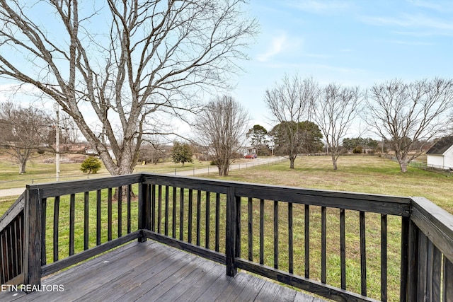 deck featuring a lawn