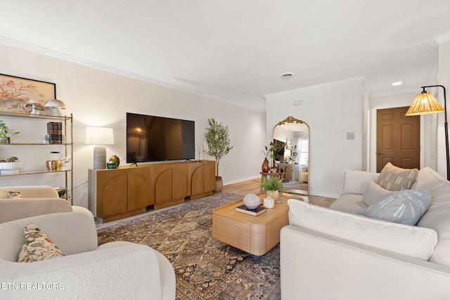 living room featuring recessed lighting, wood finished floors, baseboards, and ornamental molding