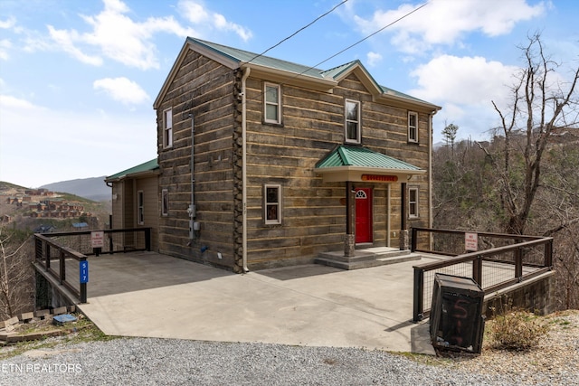 view of front of home with metal roof