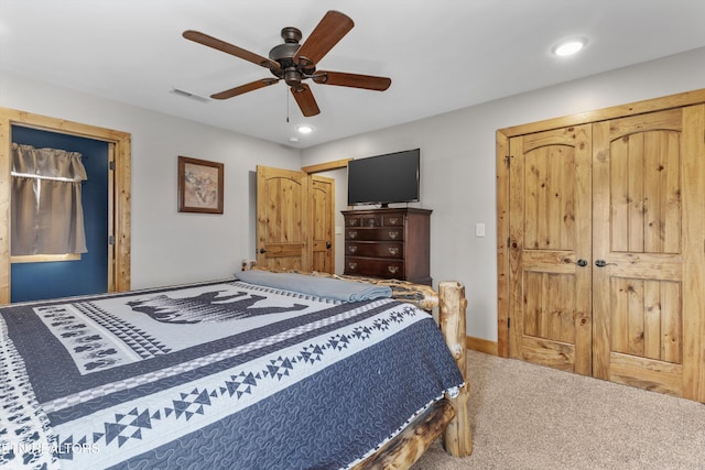 carpeted bedroom featuring recessed lighting, visible vents, and a ceiling fan