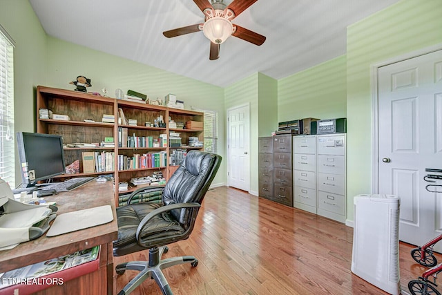 home office with ceiling fan, baseboards, and wood finished floors