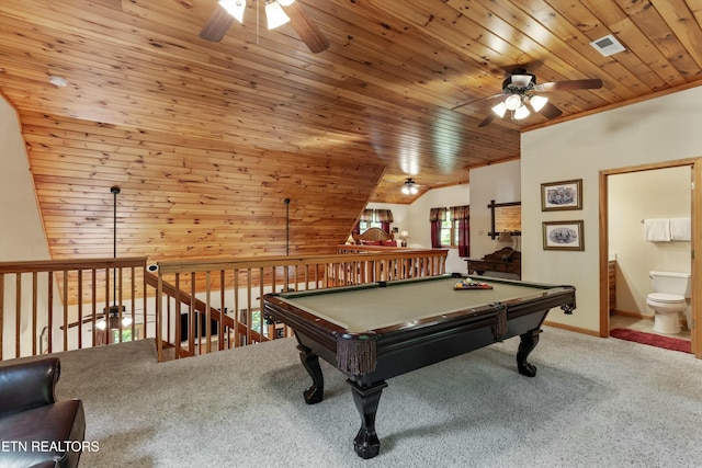 recreation room featuring vaulted ceiling, carpet flooring, visible vents, and ceiling fan