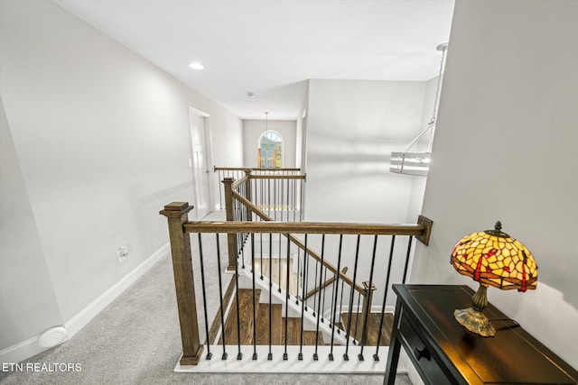 stairs with recessed lighting, baseboards, and carpet floors