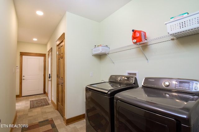 clothes washing area featuring washer and dryer, laundry area, recessed lighting, and baseboards