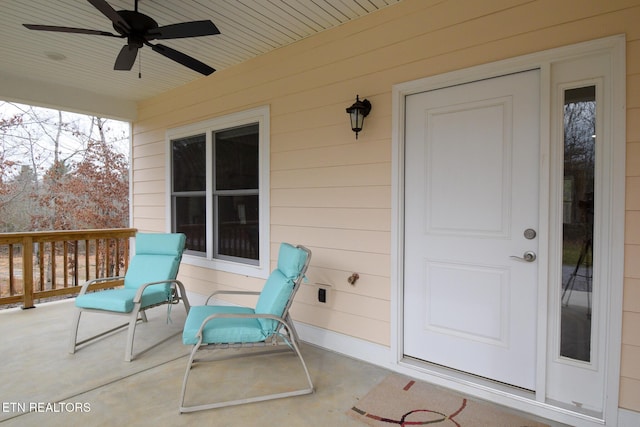 view of patio featuring a ceiling fan