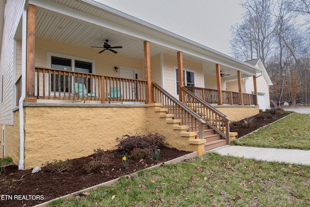 property entrance with a porch and ceiling fan