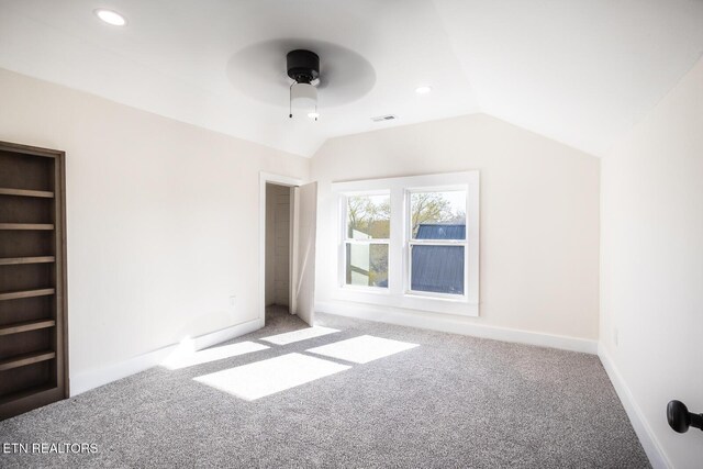 717 N Charles Seivers Blvd, Clinton, TN 37716 - unfurnished bedroom with carpet, visible vents, lofted ceiling, and recessed lighting