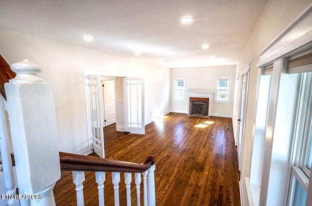 717 N Charles Seivers Blvd, Clinton, TN 37716 - unfurnished living room with baseboards, dark wood finished floors, a fireplace, and recessed lighting