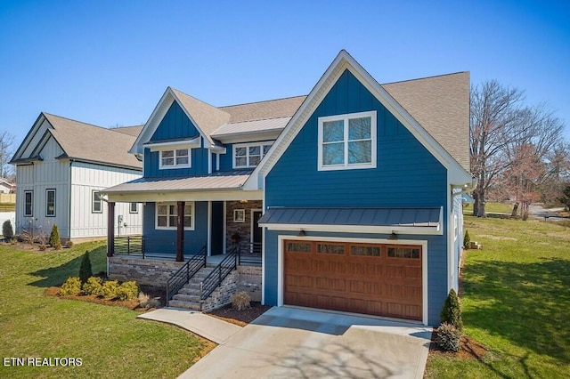 view of front facade featuring board and batten siding, a front lawn, covered porch, an attached garage, and a standing seam roof